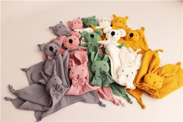 Riki: knuffeldoek met extra's in de vorm van een uil