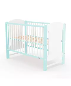 Klassiek babybedje in wit en mint voor peuterslaapkamer