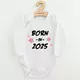 Babyromper - Witte longsleeve - BORN IN 2025 - 100% katoen